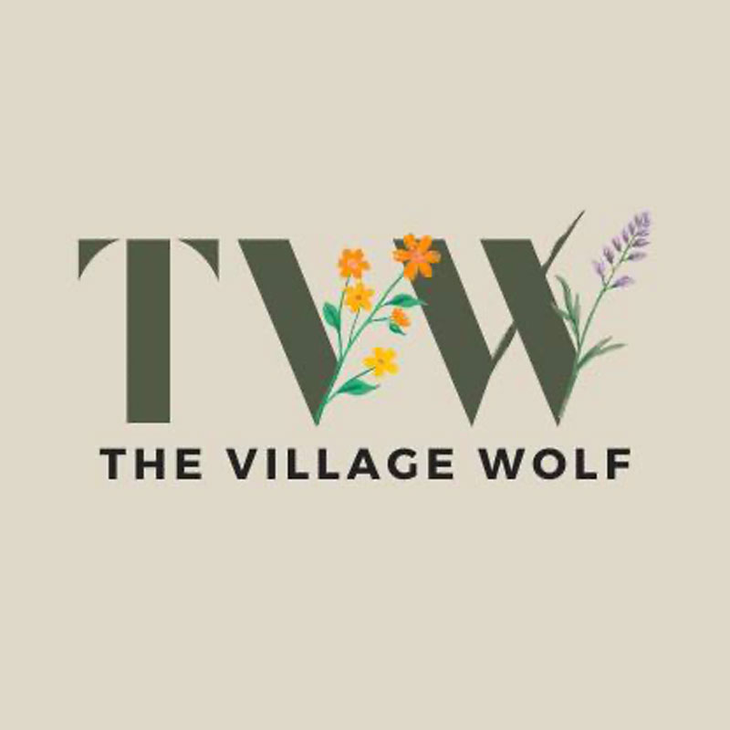 The The Village Wolf Logo on tan