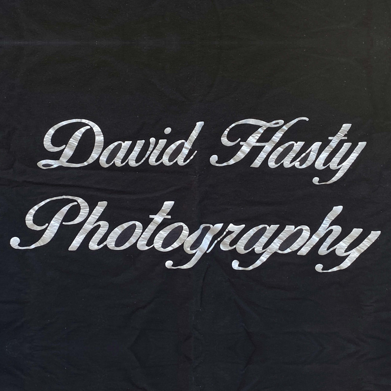 An image of black fabric that says David Hasty Photography
